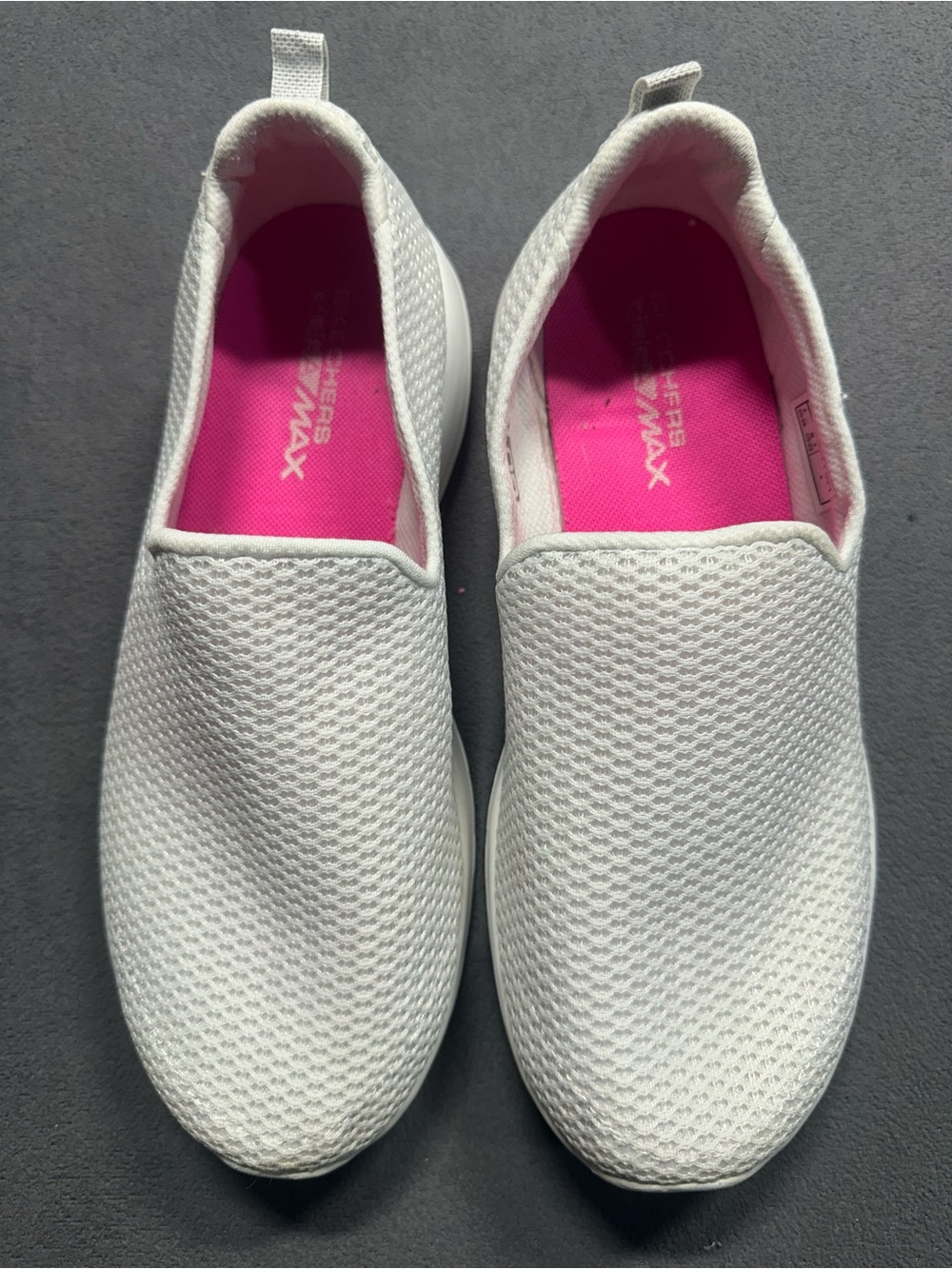 Skechers Women’s White Slip-On Sneakers with Pink Insole